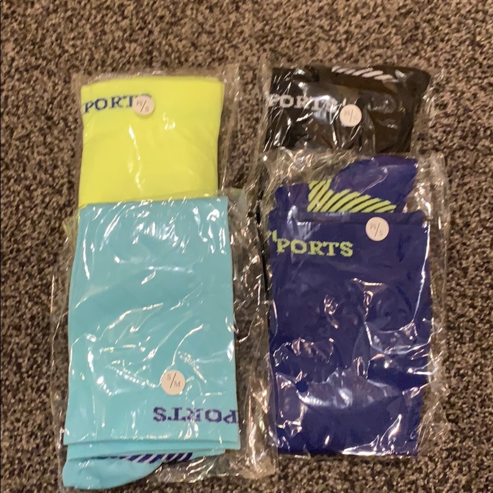 Four S/M new in package compression socks